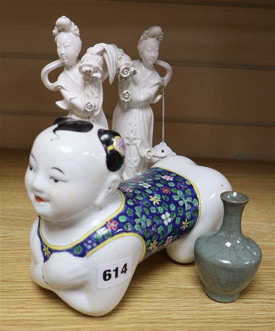 A Chinese green crackle glaze vase, two Chinese blanc de Chine figures and a pillow